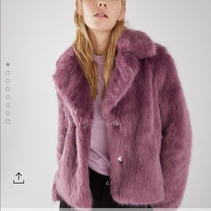 Short faux fur coat with lapel collar